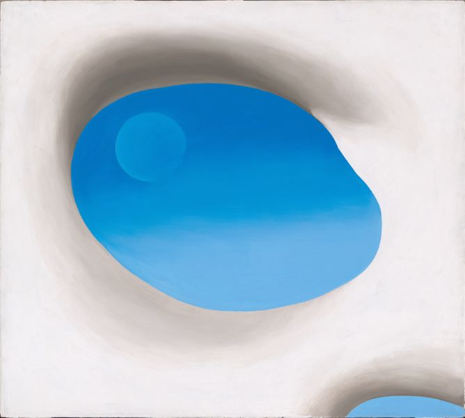 A white background with a blue oval showing a blue sky in a painting.